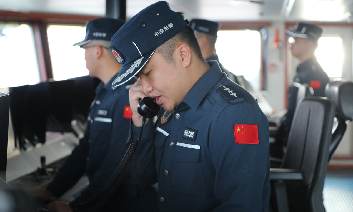 CCG officers on board?the <em>Wanshan</em>?are on duty in the cockpit in the waters off Huangyan Dao on June 17, 2024. Photo: Courtesy of China Coast Guard