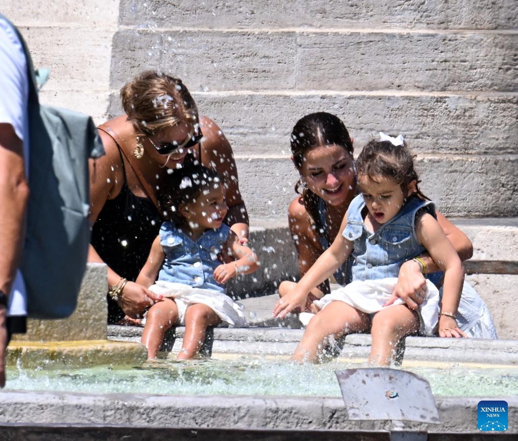 People cool off at Fontana dei Leoni during a heatwave in Rome, Italy, on Aug. 14, 2024. (Photo: Xinhua)