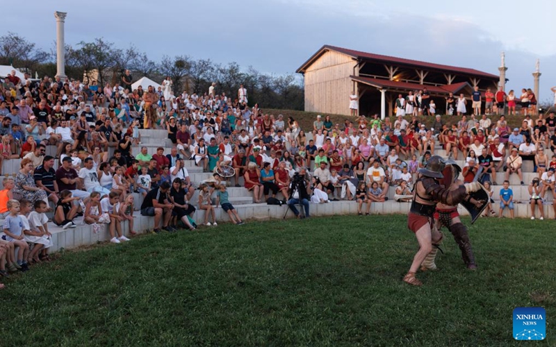 Participants dressed as gladiators show their battle skills during the Roman Games at the amphitheater in Ptuj, Slovenia, Aug. 17, 2024. The Roman Games, one of the largest presentations of the Roman period in Slovenia, was held in Ptuj on Saturday. Photo: Xinhua