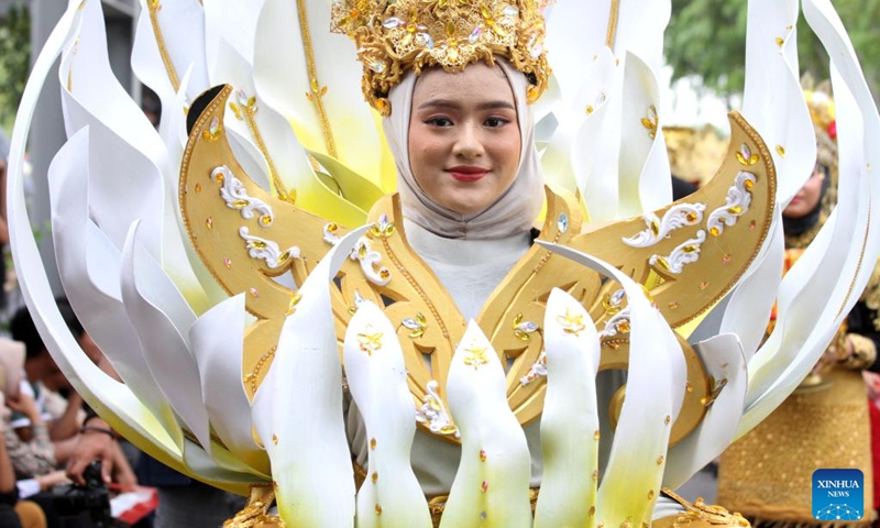 A student participates in a cultural parade to celebrate the 79th anniversary of Indonesia Independence Day in Banda Aceh, Aceh Province, Indonesia, Aug. 18, 2024. Photo: Xinhua