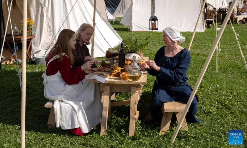 Reenactors are pictured during the Hame Medieval Festival in Hameenlinna, Finland on Aug. 17, 2024. The southern Finnish city of Hameenlinna hosted the Hame Medieval Festival, one of Finland's largest historical festivals, on the picturesque lakeside meadow beside Hame Castle from Aug. 16 to 18. Photo: Xinhua