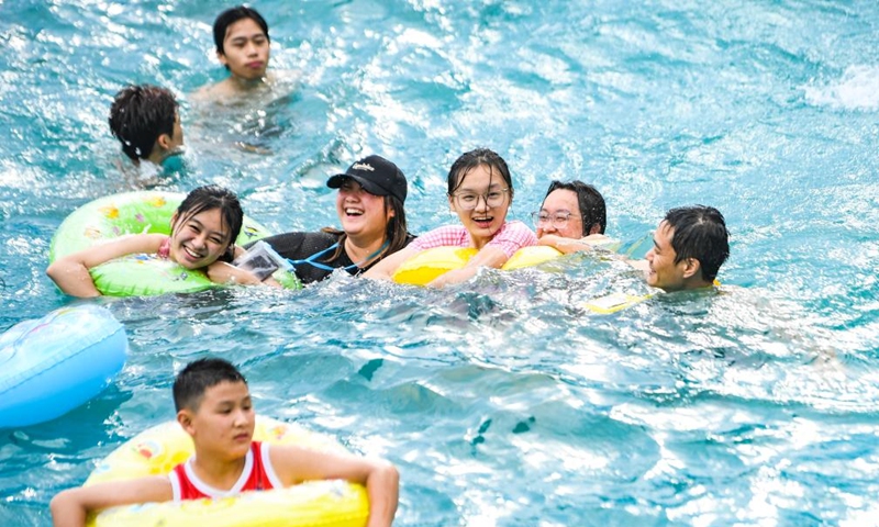 Tourists have fun at a water park in Fuling District, southwest China's Chongqing Municipality, Aug. 18, 2024. Photo: Xinhua