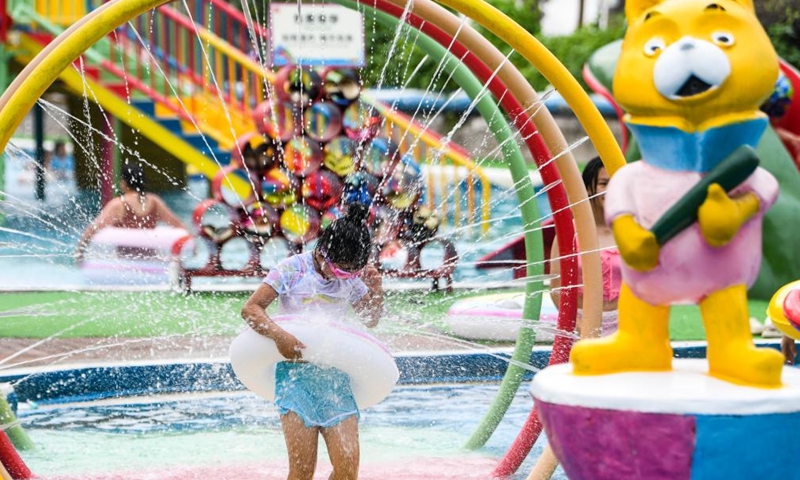 A girl has fun at a water park in Fuling District, southwest China's Chongqing Municipality, Aug. 18, 2024. Photo: Xinhua