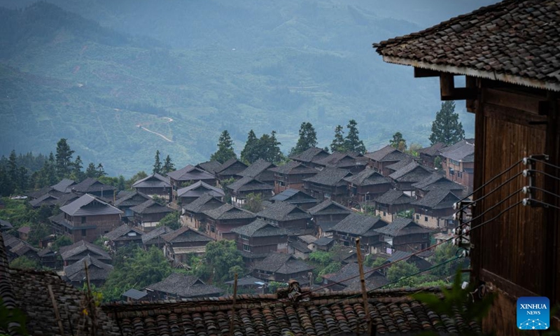 This photo taken on Aug. 16, 2024 shows a view of Basha Village in Congjiang County of Qiandongnan Miao and Dong Autonomous Prefecture, southwest China's Guizhou Province. Basha means a place with numerous vegetation in the language of Miao ethnic group. Basha Village consists of five hamlets. The Miao village is about seven kilometers away from Congjiang county seat. It features beautiful scenery, unique stilted buildings and well preserved cultural relics including ancient wells, forests and grain barns. Photo: Xinhua