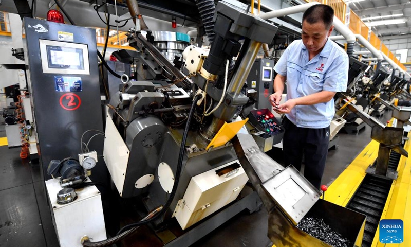 A worker works at an intelligent digital workshop of a fastener manufacturing company in Yongnian District of Handan, north China's Hebei Province, Aug. 16, 2024. Yongnian District in Handan City, north China's Hebei Province, houses over 200 fastener companies. In 2023, these companies there produced six million tons of fasteners, accounting 58 percent of the national market, and their goods found markets in over 110 countries and regions. Photo: Xinhua