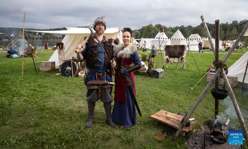 Reenactors pose for a photo at the Hame Medieval Festival in Hameenlinna, Finland on Aug. 17, 2024. The southern Finnish city of Hameenlinna hosted the Hame Medieval Festival, one of Finland's largest historical festivals, on the picturesque lakeside meadow beside Hame Castle from Aug. 16 to 18. Photo: Xinhua