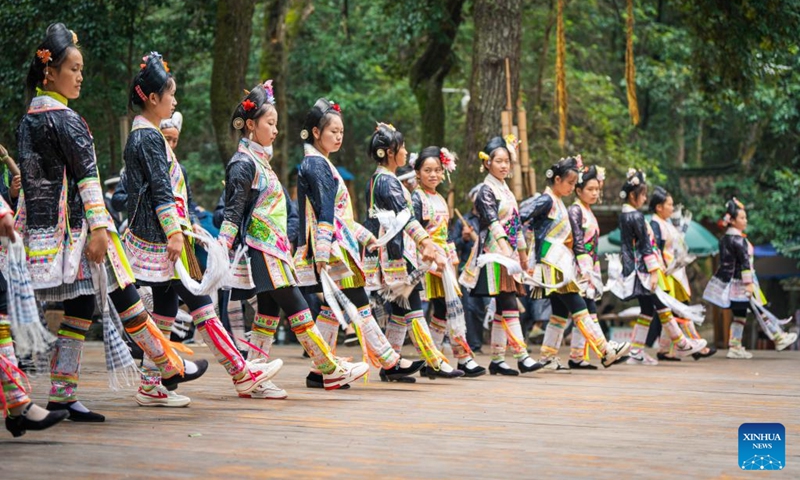 Villagers dance at a scenic spot in Basha Village, Congjiang County of Qiandongnan Miao and Dong Autonomous Prefecture, southwest China's Guizhou Province, Aug. 16, 2024. Photo: Xinhua