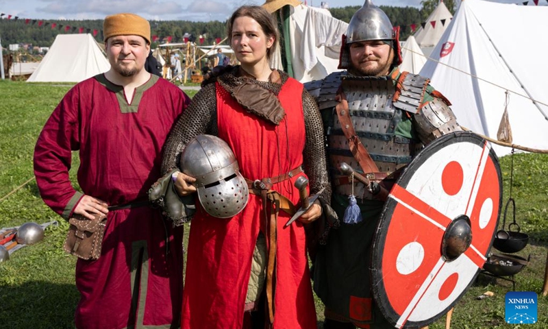 Reenactors pose for a photo at the Hame Medieval Festival in Hameenlinna, Finland on Aug. 17, 2024. The southern Finnish city of Hameenlinna hosted the Hame Medieval Festival, one of Finland's largest historical festivals, on the picturesque lakeside meadow beside Hame Castle from Aug. 16 to 18. Photo: Xinhua