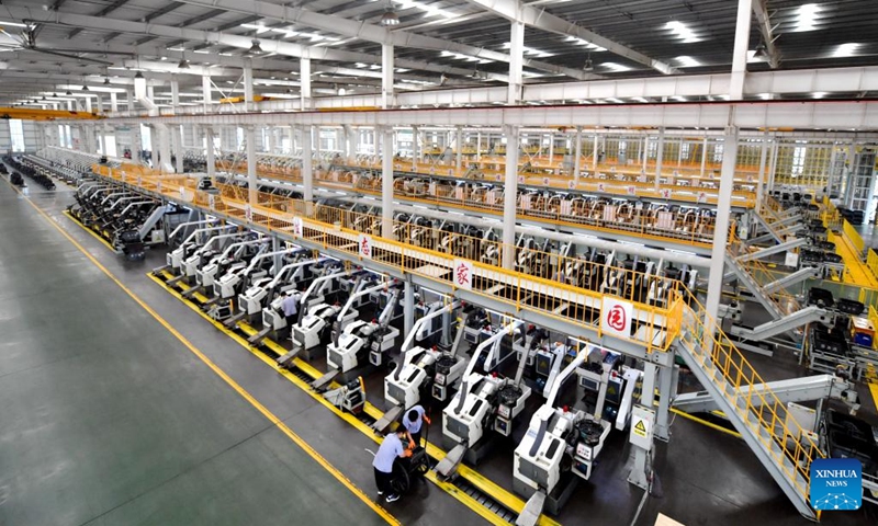 Workers work at an intelligent digital workshop of a fastener manufacturing company in Yongnian District of Handan, north China's Hebei Province, Aug. 16, 2024. Yongnian District in Handan City, north China's Hebei Province, houses over 200 fastener companies. In 2023, these companies there produced six million tons of fasteners, accounting 58 percent of the national market, and their goods found markets in over 110 countries and regions. Photo: Xinhua