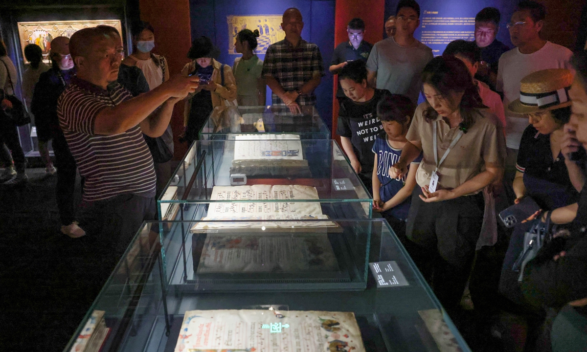 People visit an exhibition titled A Journey of Knowledge: The Travels of Marco Polo and Its Legacy between East and West, on July 26, 2024 at the Beijing World Art Museum in Beijing. Photo: VCG