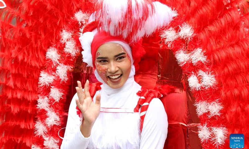 A student participates in a cultural parade to celebrate the 79th anniversary of Indonesia Independence Day in Banda Aceh, Aceh Province, Indonesia, Aug. 18, 2024. hoto: Xinhua