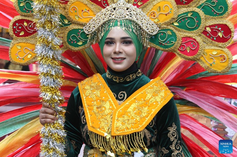 A student participates in a cultural parade to celebrate the 79th anniversary of Indonesia Independence Day in Banda Aceh, Aceh Province, Indonesia, Aug. 18, 2024. Photo: Xinhua