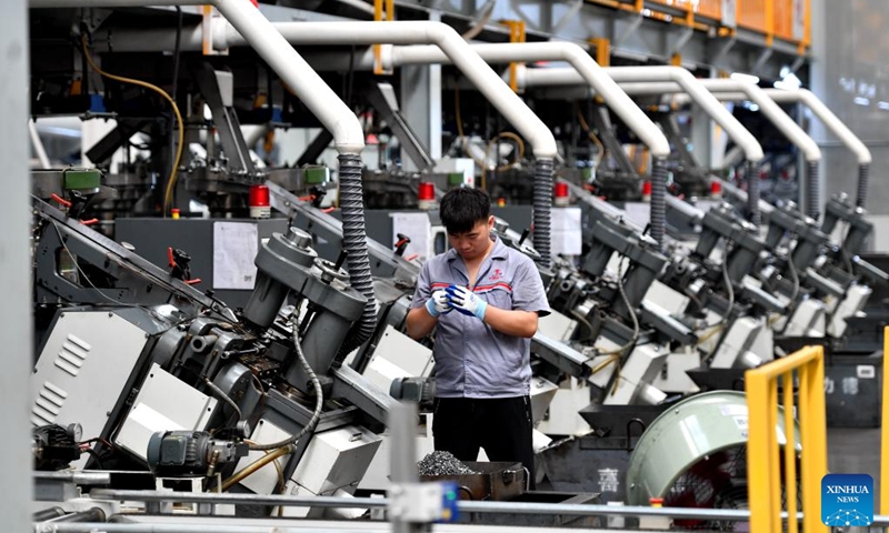 A worker works at an intelligent digital workshop of a fastener manufacturing company in Yongnian District of Handan, north China's Hebei Province, Aug. 16, 2024. Yongnian District in Handan City, north China's Hebei Province, houses over 200 fastener companies. In 2023, these companies there produced six million tons of fasteners, accounting 58 percent of the national market, and their goods found markets in over 110 countries and regions. Photo: Xinhua