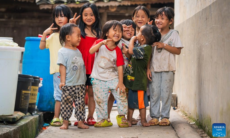 Children pose for a group photo in Basha Village, Congjiang County of Qiandongnan Miao and Dong Autonomous Prefecture, southwest China's Guizhou Province, Aug. 16, 2024. Photo: Xinhua