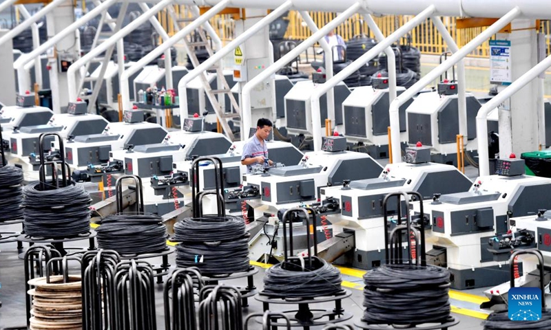 A worker works at an intelligent digital workshop of a fastener manufacturing company in Yongnian District of Handan, north China's Hebei Province, Aug. 16, 2024. Yongnian District in Handan City, north China's Hebei Province, houses over 200 fastener companies. In 2023, these companies there produced six million tons of fasteners, accounting 58 percent of the national market, and their goods found markets in over 110 countries and regions. Photo: Xinhua