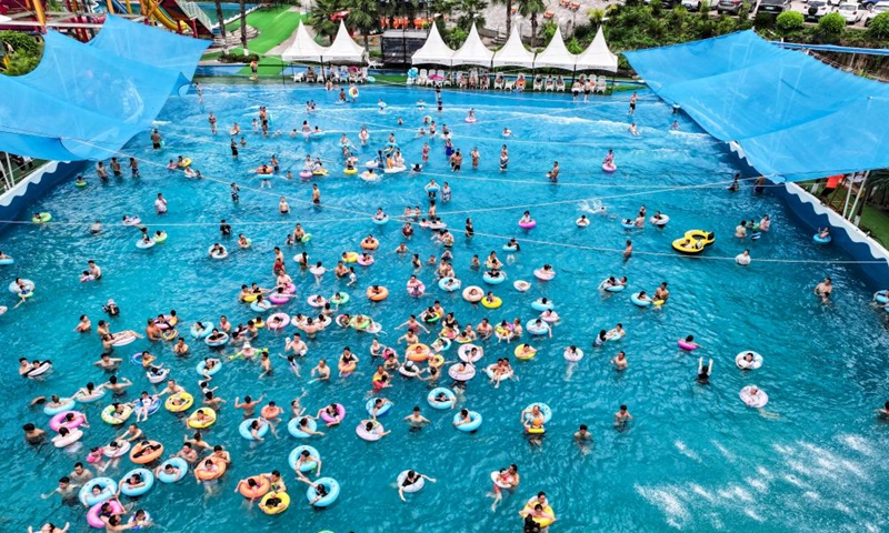 An aerial drone photo shows tourists having fun at a water park in Fuling District, southwest China's Chongqing Municipality, Aug. 18, 2024. Photo: Xinhua