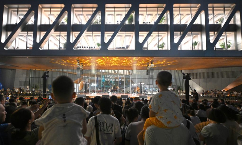 People enjoy an outdoor concert at the Tianjin Juilliard School in north China's Tianjin, Aug. 16, 2024. The outdoor concert, which kicked off here on Friday, will last until late September this year. Photo: Xinhua