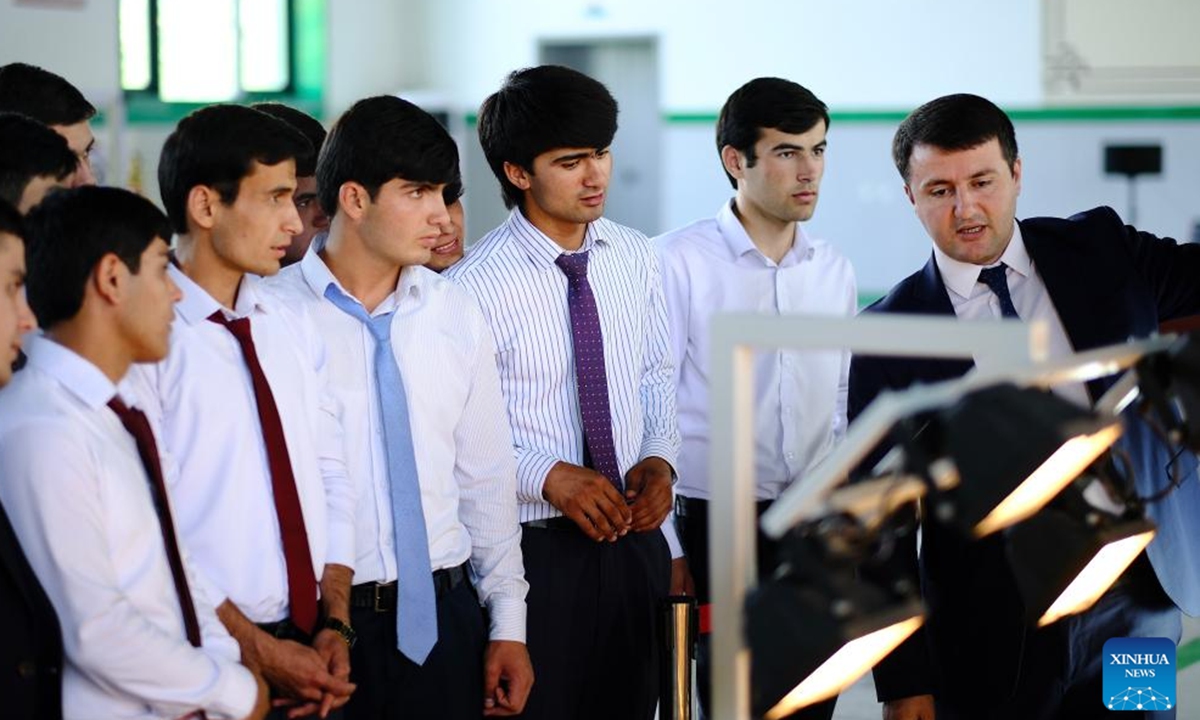 Students listen as a teacher gives instructions at the Luban Workshop in Dushanbe, Tajikistan, June 14, 2024. Photo: Xinhua