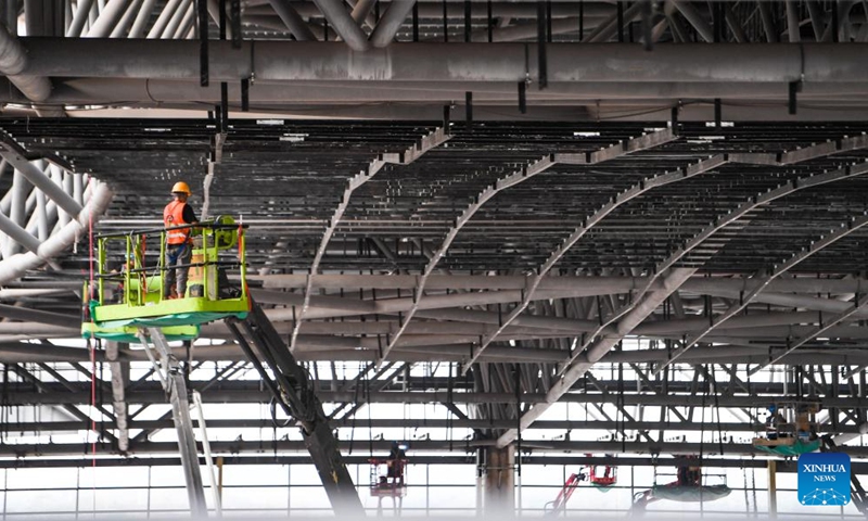 A worker operates at the construction site of Chongqing East Railway Station and affiliated comprehensive transportation hub in southwest China's Chongqing, Aug. 17, 2024. Photo: Xinhua