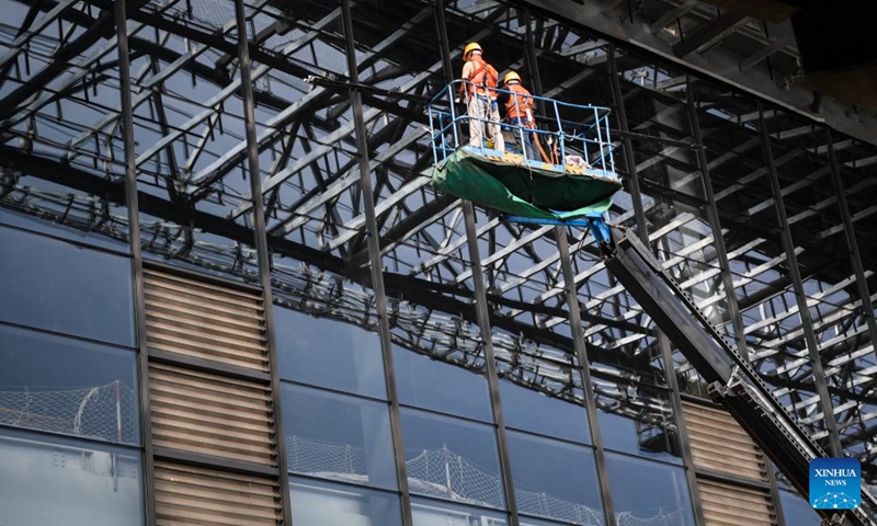 Workers operate at the construction site of Chongqing East Railway Station and affiliated comprehensive transportation hub in southwest China's Chongqing, Aug. 17, 2024. Photo: Xinhua