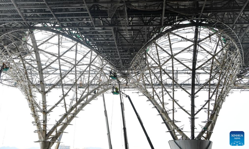 Workers operate at the construction site of Chongqing East Railway Station and affiliated comprehensive transportation hub in southwest China's Chongqing, Aug. 17, 2024. Photo: Xinhua