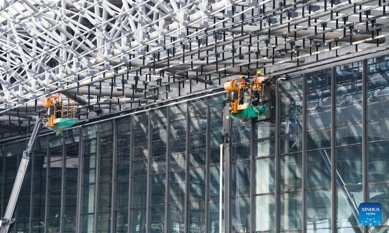 Workers operate at the construction site of Chongqing East Railway Station and affiliated comprehensive transportation hub in southwest China's Chongqing, Aug. 17, 2024. Photo: Xinhua