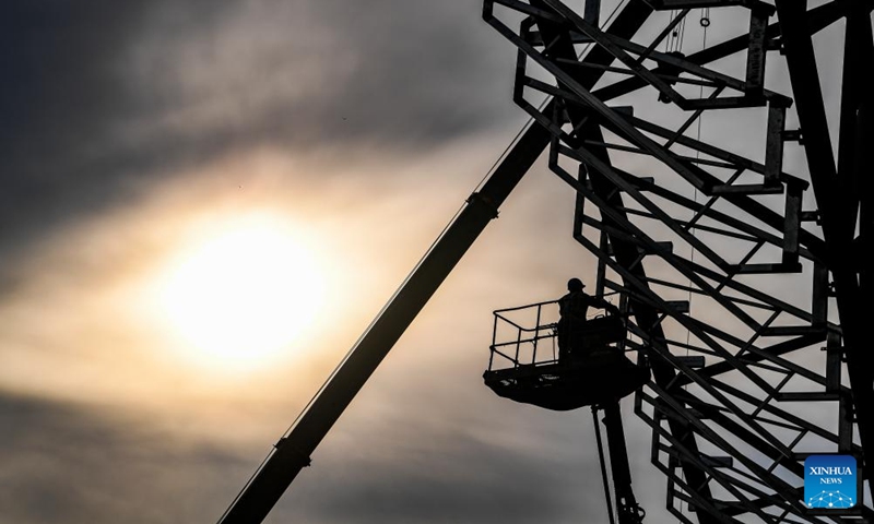 A worker operates at the construction site of Chongqing East Railway Station and affiliated comprehensive transportation hub in southwest China's Chongqing, Aug. 17, 2024. Photo: Xinhua