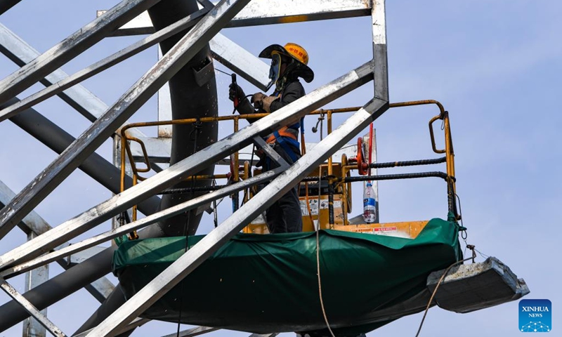 A construction worker welds at the construction site of Chongqing East Railway Station and affiliated comprehensive transportation hub in southwest China's Chongqing, Aug. 17, 2024. Photo: Xinhua