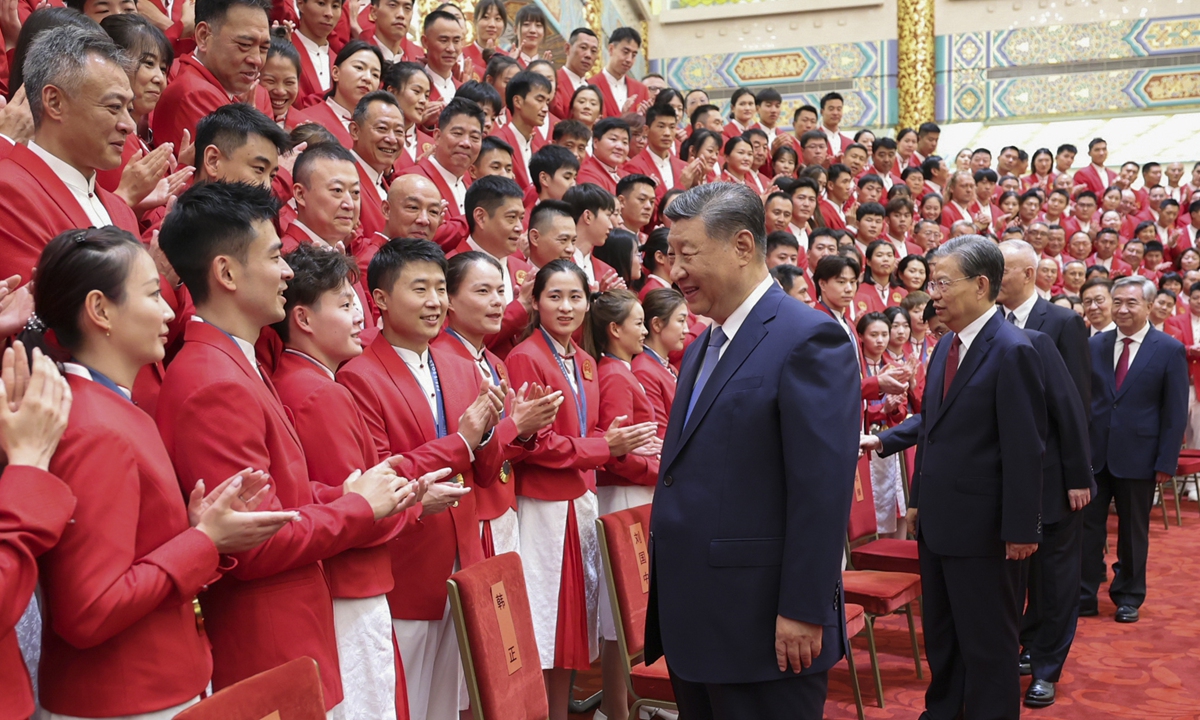 President Xi Jinping meets with China's Olympic delegation for Paris 2024 at the Great Hall of the People in Beijing on August 20, 2024. Team China clinched 40 gold, 27 silver and 24 bronze medals in Paris. Photo: Xinhua