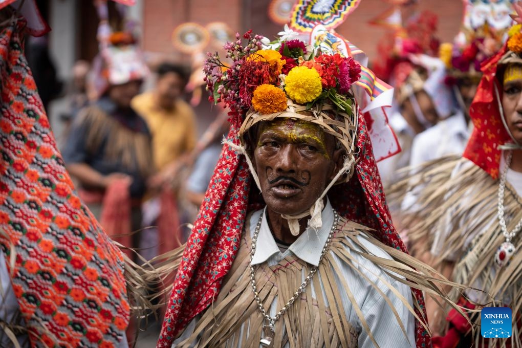 A man participates in a procession to mark the Gaijatra Festival in Kathmandu, Nepal, Aug. 20, 2024. The Gaijatra Festival, or Cow Festival, is marked here on Tuesday. (Photo: Xinhua)