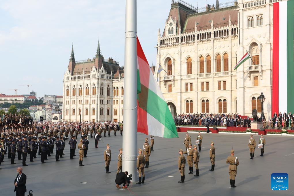 A flag-raising ceremony is held to celebrate Hungarian national holiday at Kossuth Square in front of the parliament building in Budapest, Hungary on Aug. 20, 2024. Hungary marked its national holiday and commemorated Saint Stephen (969-1038), the founding king of Hungary, on Tuesday. (Photo: Xinhua)