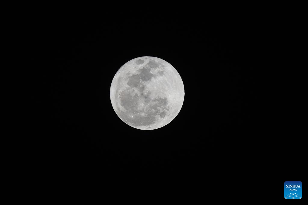 A full moon is seen from the Square of Three Powers, in Brasília, Brazil, Aug. 19, 2024. (Photo: Xinhua)