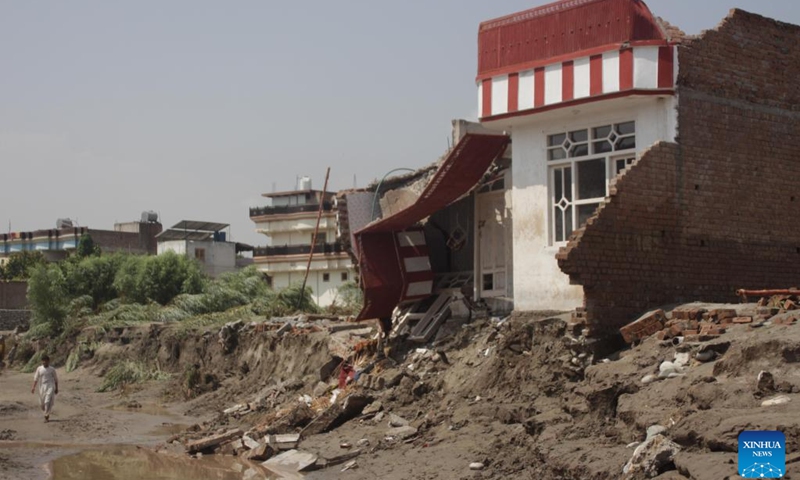 This photo taken on Aug. 21, 2024 shows a crumbling house in a flood-hit area in Jalalabad City, capital of Nangarhar province, east Afghanistan. At least one person has been confirmed dead and seven others sustained injuries as a flash flood swept through parts of eastern Afghanistan's Nangarhar province on Tuesday night, provincial Director for Information and Culture Qurishi Badlon said Wednesday. (Photo: Xinhua)