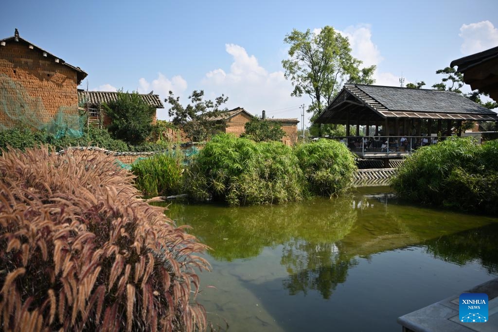 This photo shows a view of Wolong ancient village in Kunming, southwest China's Yunnan Province, Aug. 21, 2024. Located in Chenggong District of Kunming City, Wolong is dotted with ancient buildings. In recent years, local authorities have vigorously promoted ecological management, ancient buildings restoration, and cultural and tourism integration in an effort to achieve high-quality development. (Photo: Xinhua)