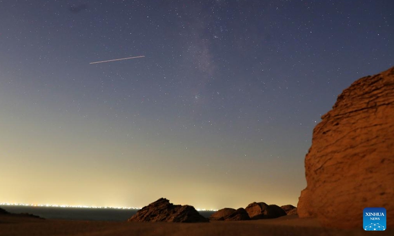 This long exposure photo taken on Aug. 23, 2024 shows the starry sky over the desert in Watermelon Valley of Fayoum, Egypt. (Xinhua/Wang Dongzhen)