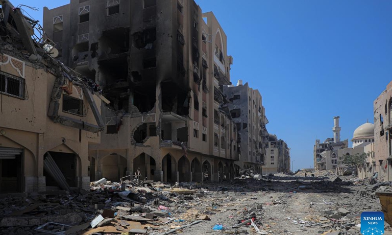 Residential buildings destroyed by Israeli warplanes are pictured at the Hamad City, in the southern Gaza Strip city of Khan Younis, on Aug. 24, 2024. (Photo by Rizek Abdeljawad/Xinhua)