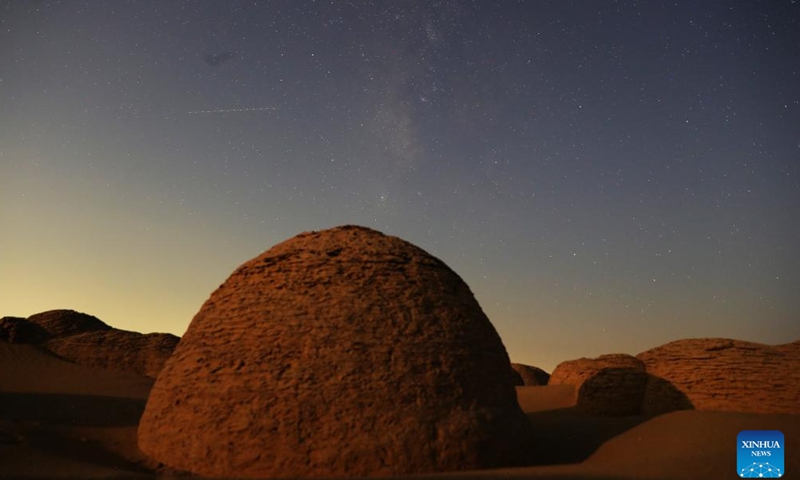 This long exposure photo taken on Aug. 23, 2024 shows the starry sky over the desert in Watermelon Valley of Fayoum, Egypt. (Xinhua/Wang Dongzhen)