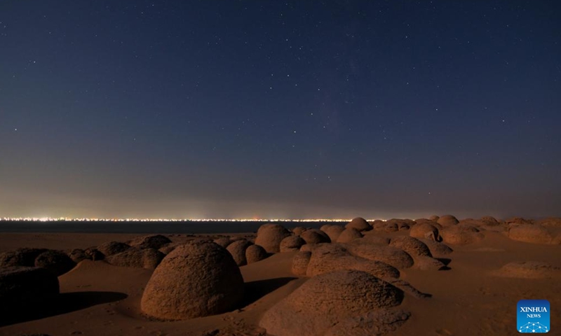 This long exposure photo taken on Aug. 23, 2024 shows the starry sky over the desert in Watermelon Valley of Fayoum, Egypt. (Xinhua/Liu Minhao)