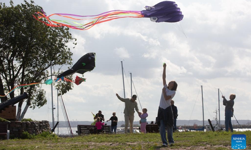 People fly kites during a kite festival in Kronstadt, St. Petersburg, Russia, Aug. 24, 2024. The festival was held here from Aug. 24 to 25. (Photo by Irina Motina/Xinhua)