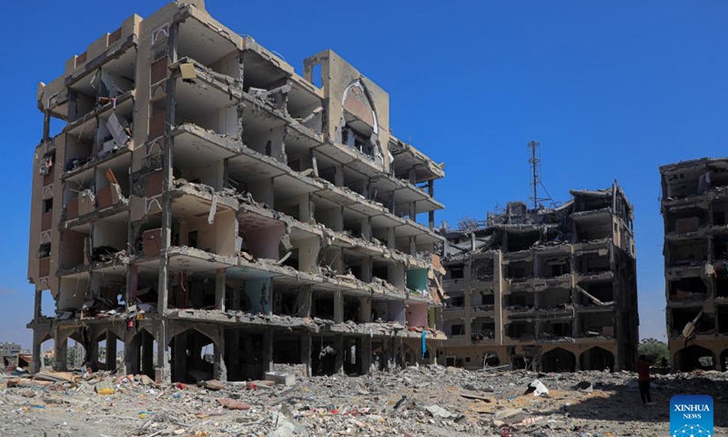 Residential buildings destroyed by Israeli warplanes are pictured at the Hamad City, in the southern Gaza Strip city of Khan Younis, on Aug. 24, 2024. (Photo by Rizek Abdeljawad/Xinhua)