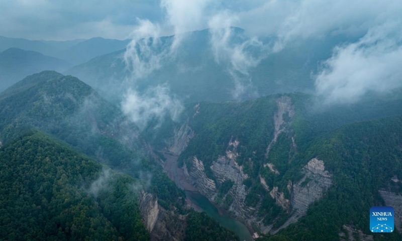 An aerial drone photo taken on Aug. 24, 2024 shows a view of Liupanshan National Forest Park shrouded in clouds in Guyuan City, northwest China's Ningxia Hui Autonomous Region. (Xinhua/Feng Kaihua)