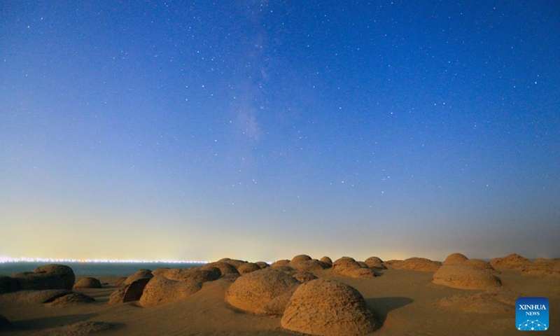 This long exposure photo taken on Aug. 23, 2024 shows the starry sky over the desert in Watermelon Valley of Fayoum, Egypt. (Xinhua/Sui Xiankai)