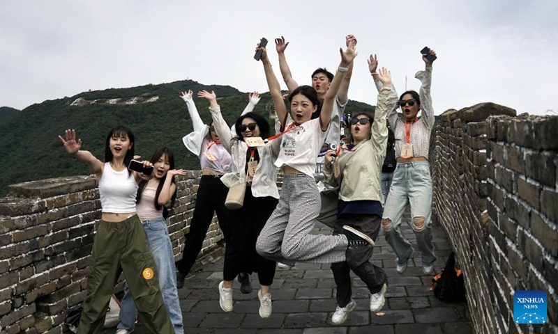 Participants of a cross-Strait journalism camp pose for a photo at Mutianyu section of the Great Wall in Beijing, capital of China, Aug. 25, 2024.

A cross-Strait journalism camp for university students opened on Tuesday in the city of Hohhot, north China's Inner Mongolia Autonomous Region, with approximately 200 students from both the mainland and Taiwan in attendance.

The students are from 10 universities on the mainland and eight universities in Taiwan.