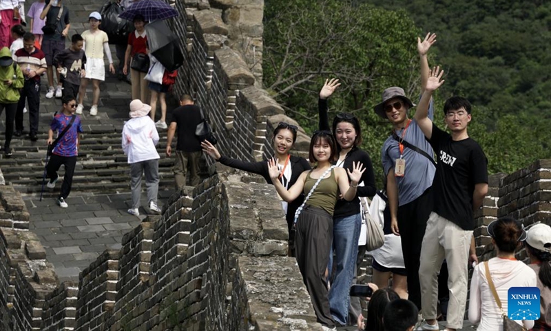 Participants of a cross-Strait journalism camp pose for a photo at Mutianyu section of the Great Wall in Beijing, capital of China, Aug. 25, 2024.

A cross-Strait journalism camp for university students opened on Tuesday in the city of Hohhot, north China's Inner Mongolia Autonomous Region, with approximately 200 students from both the mainland and Taiwan in attendance.

The students are from 10 universities on the mainland and eight universities in Taiwan.