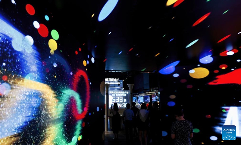 People visit an innovation center of China's sportswear giant Anta in Jinjiang, southeast China's Fujian Province, Aug. 22, 2024. Jinjiang, a county-level city covering a total area of 649 square kilometers, is home to some 96,000 private enterprises that contributed over 90 percent of the city's industrial output, tax revenue and job opportunities in 2023. (Xinhua/Wei Peiquan)