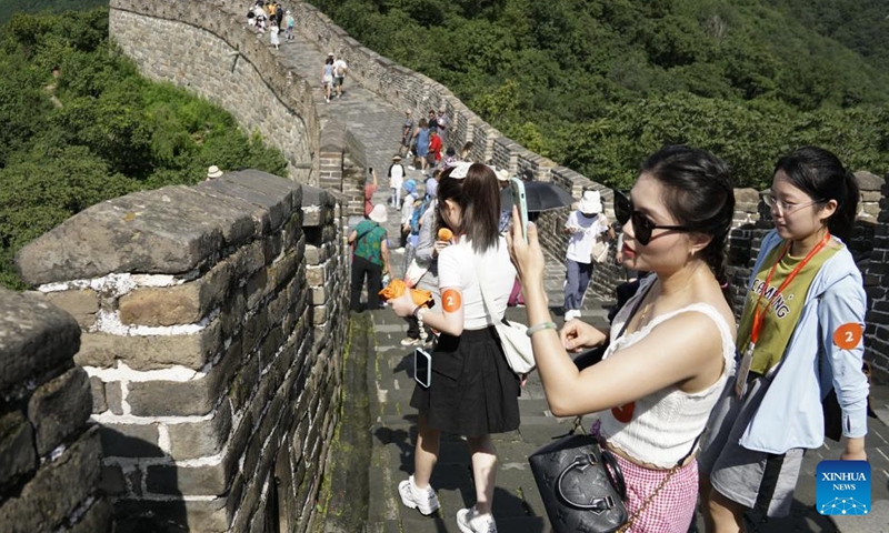 Participants of a cross-Strait journalism camp pose for a photo at Mutianyu section of the Great Wall in Beijing, capital of China, Aug. 25, 2024.

A cross-Strait journalism camp for university students opened on Tuesday in the city of Hohhot, north China's Inner Mongolia Autonomous Region, with approximately 200 students from both the mainland and Taiwan in attendance.

The students are from 10 universities on the mainland and eight universities in Taiwan.