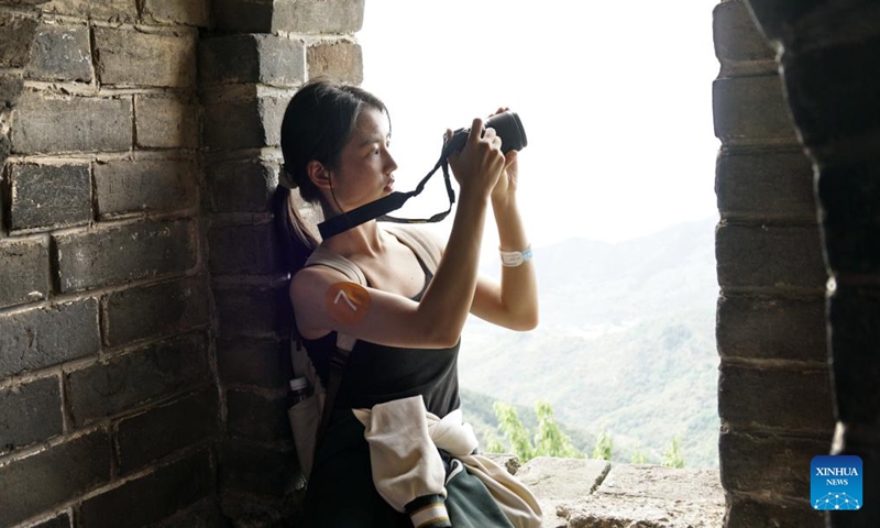 Participants of a cross-Strait journalism camp pose for a photo at Mutianyu section of the Great Wall in Beijing, capital of China, Aug. 25, 2024.

A cross-Strait journalism camp for university students opened on Tuesday in the city of Hohhot, north China's Inner Mongolia Autonomous Region, with approximately 200 students from both the mainland and Taiwan in attendance.

The students are from 10 universities on the mainland and eight universities in Taiwan.