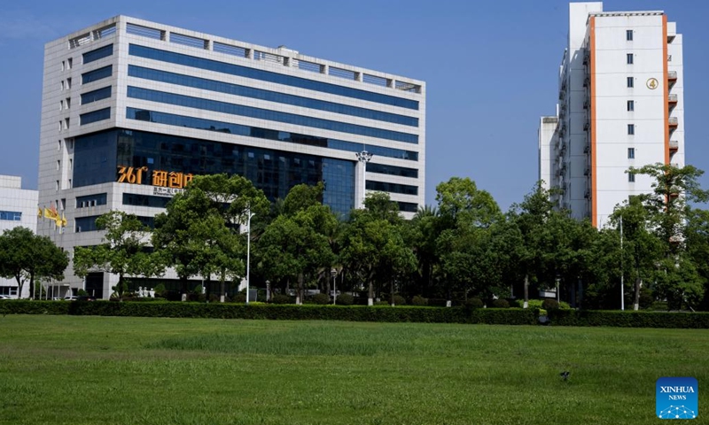 This photo shows an exterior view of a research and innovation center of China's sportswear giant 361 Degrees in Jinjiang, southeast China's Fujian Province, Aug. 23, 2024. Jinjiang, a county-level city covering a total area of 649 square kilometers, is home to some 96,000 private enterprises that contributed over 90 percent of the city's industrial output, tax revenue and job opportunities in 2023. (Xinhua/Wei Peiquan)