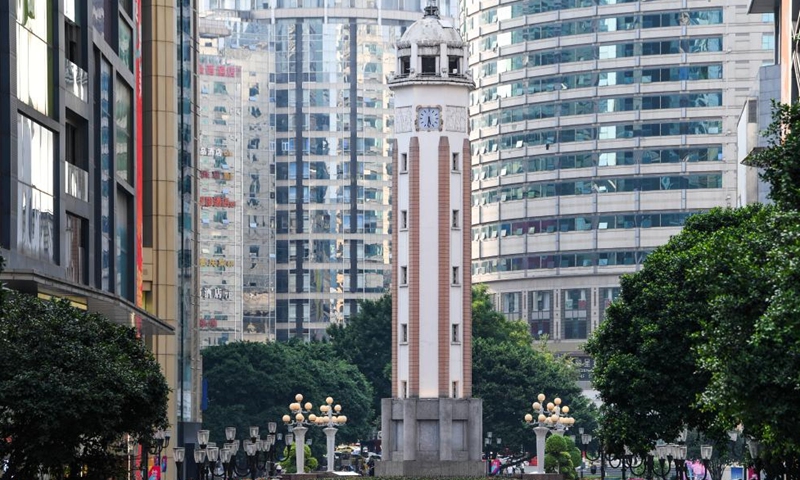 Tourists visit Jiefangbei, a business area in southwest China's Chongqing, Aug. 21, 2024. Renowned tourist destinations in Chongqing, a city known for its high temperatures, attract many tourists in summer. (Xinhua/Wang Quanchao)