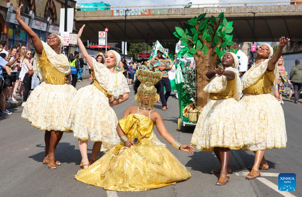 Performers participate in Notting Hill Carnival in London, Britain, on Aug. 26, 2024. Originated in the 1960s, the carnival is a way for Afro-Caribbean communities to celebrate their cultures and traditions. (Photo: Xinhua)